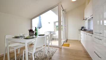 Apartment (One Bedroom Apartment) | Dining room