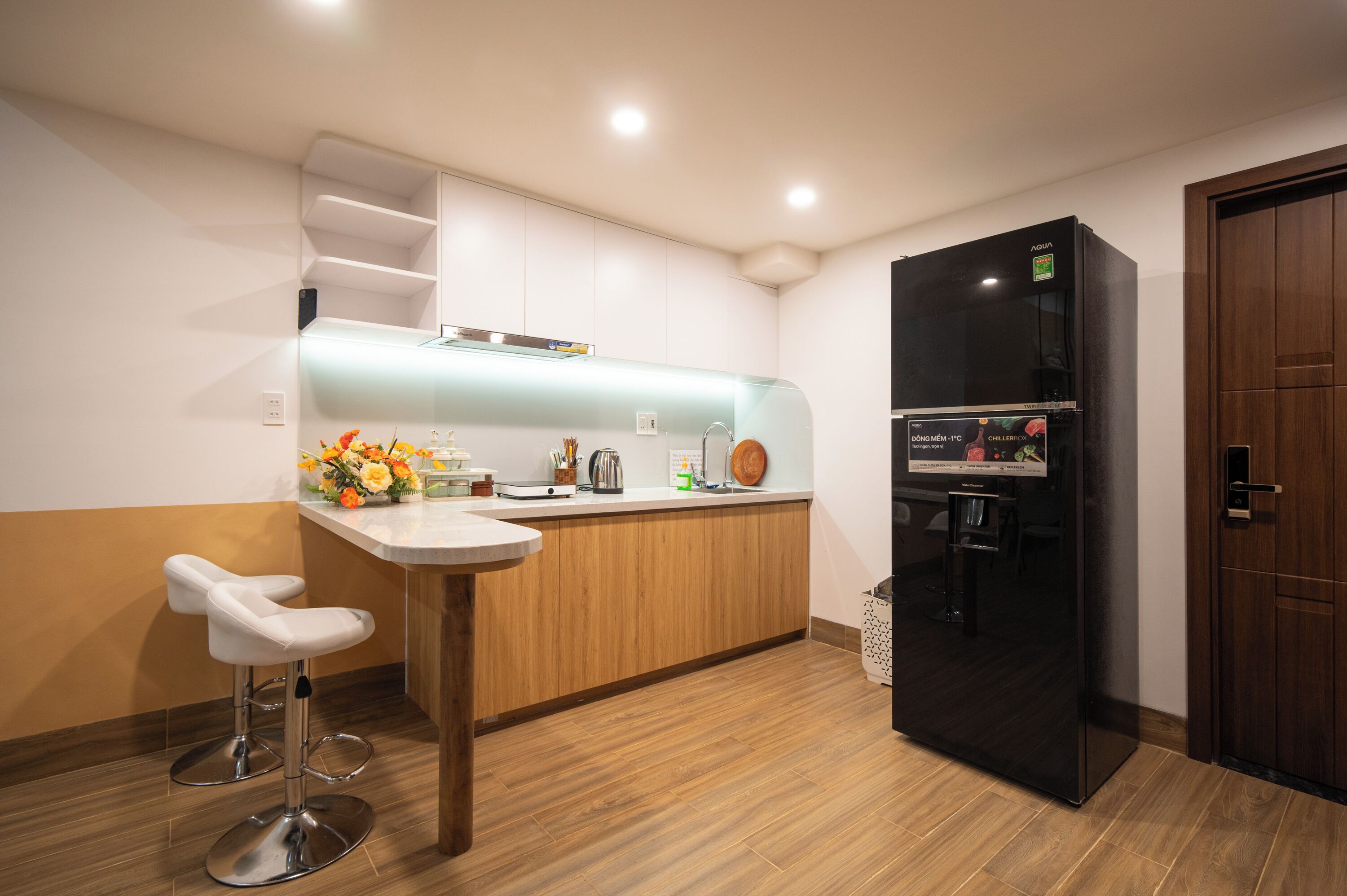 Réfrigérateur dans l'espace commun