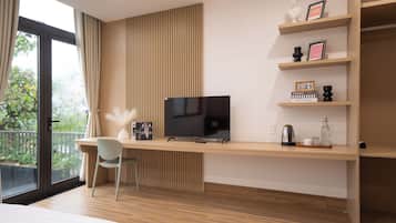 Suite, Balcony, City View | Desk, laptop workspace, iron/ironing board, free WiFi