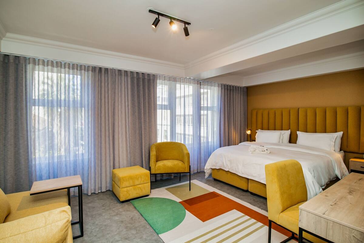 In-room safe, desk, laptop workspace, blackout curtains