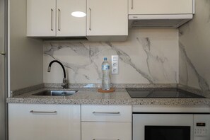 Fridge, microwave, coffee/tea maker, electric kettle