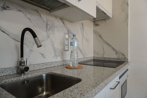 Fridge, microwave, coffee/tea maker, electric kettle