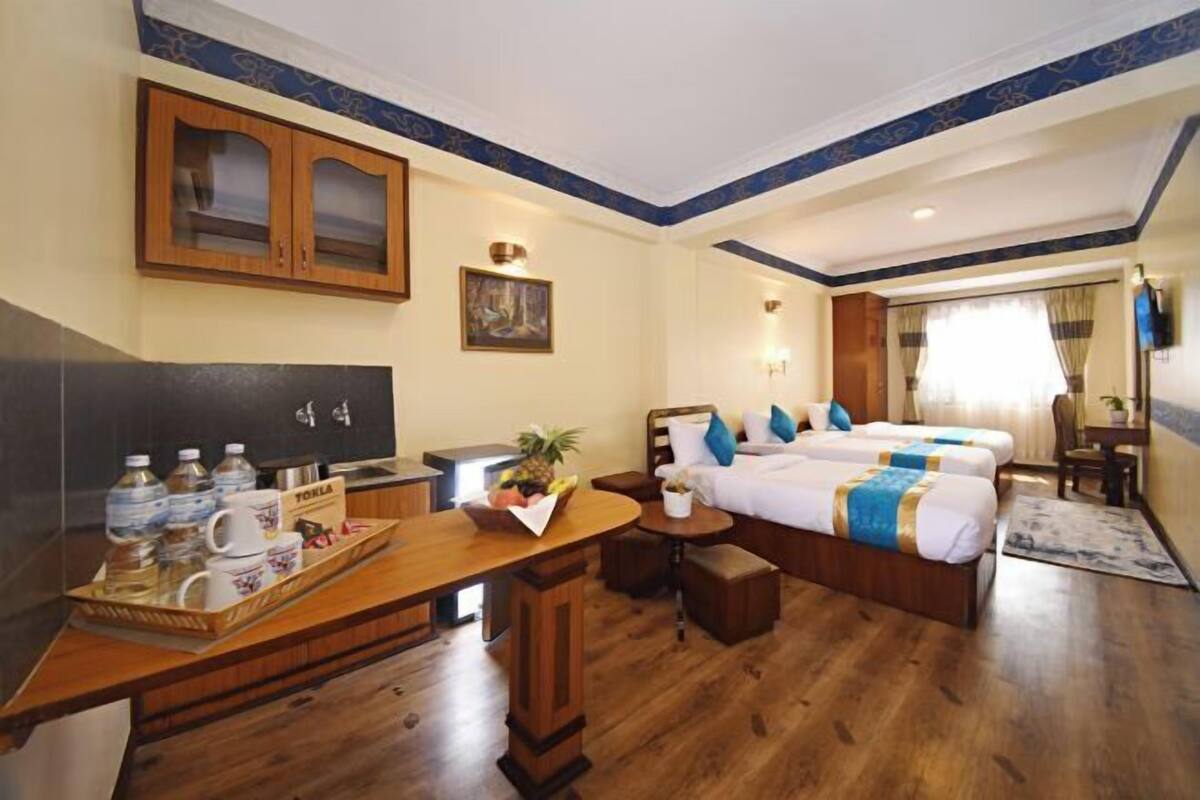 1 dormitori, escriptori i espai de treball apte per a portàtils