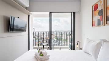 Estudio | Cortinas opacas, tabla de planchar con plancha, wifi gratis