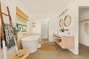 Shower, hair dryer, towels, shampoo