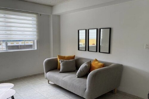 2-bedroom apartment in peaceful Santo Domingo with WiFi, AC