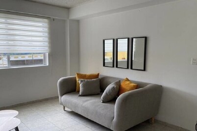 2-bedroom apartment in peaceful Santo Domingo with WiFi, AC