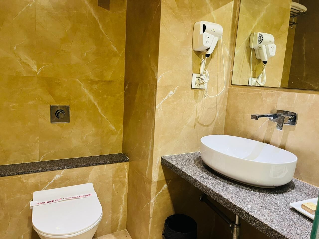 Shower, free toiletries, slippers, soap