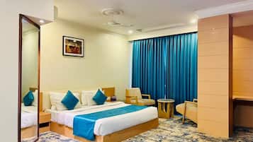 In-room safe, desk, laptop workspace, blackout curtains