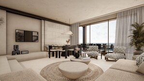A modern living room with a large window, a sofa set, a coffee table, and a dining area.