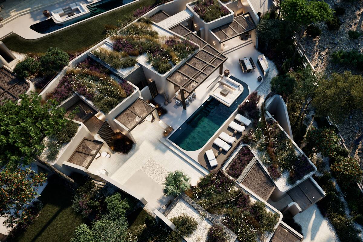 An aerial view of a modern resort with a central pool, outdoor seating areas, and landscaped gardens.