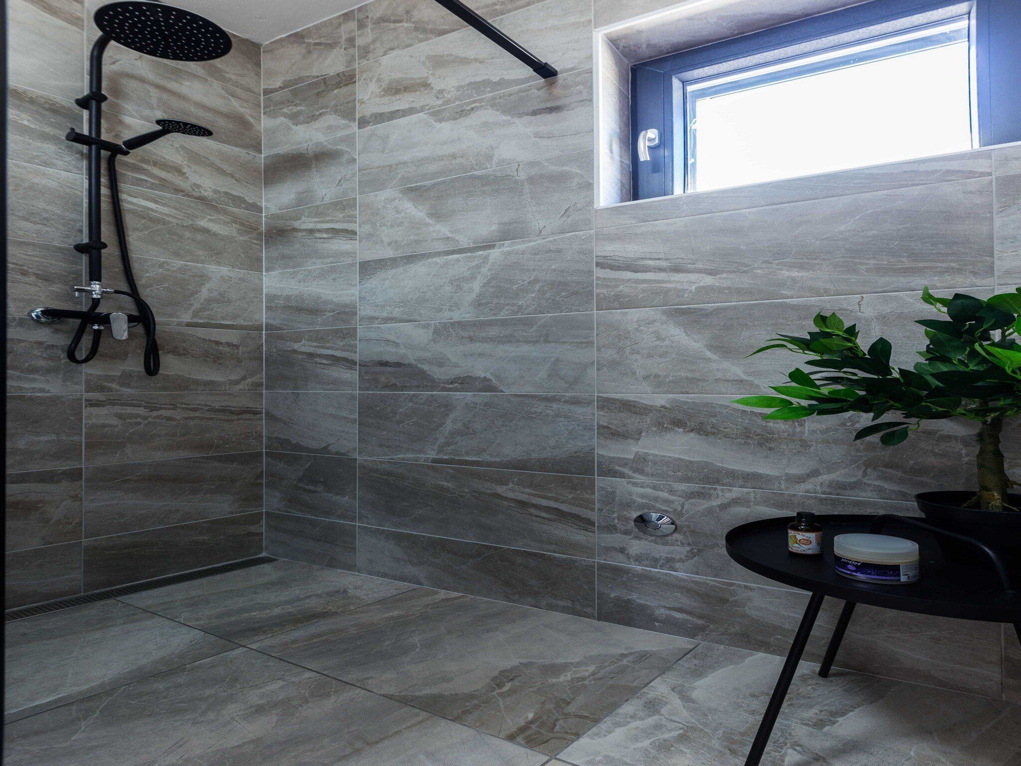 House (Charming Retreat with Lush Garden, BB) | Bathroom | Shower, towels