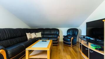 Villa (Four Bedroom Villa) | Living room | 32-inch flat-screen TV with satellite channels