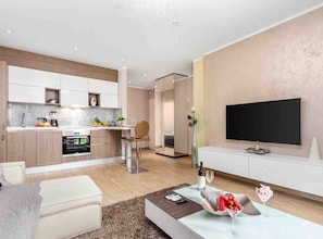 Huoneisto (One Bedroom Apartment (Romantic)) | Olohuone | 32–tuumainen taulutelevisio, jossa satelliittikanavat