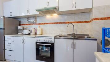 House (Two Bedroom Holiday Home) | Private kitchen | Fridge