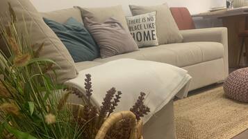 Apartment (One Bedroom Apartment 3) | Living room | 32-inch flat-screen TV with satellite channels