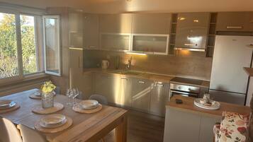 Apartment (Two Bedroom Apartment 6) | Private kitchen | Fridge