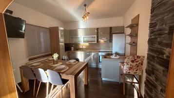 Apartment (Two Bedroom Apartment 6) | Private kitchen | Fridge