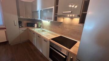 Apartment (Two Bedroom Apartment 6) | Private kitchen | Fridge