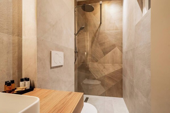 Hair dryer, towels, soap, toilet paper