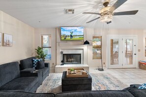 Smart TV, fireplace, foosball, books