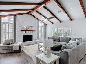 Smart TV, fireplace, books