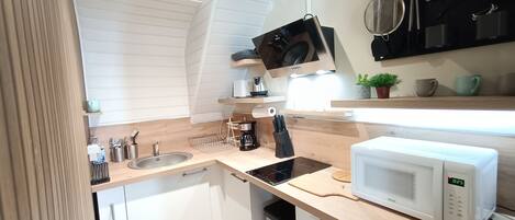 Fridge, microwave, coffee/tea maker, high chair