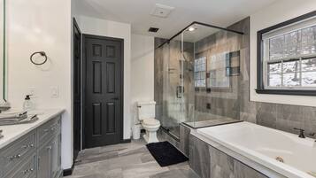 Shower, jetted tub, hair dryer, towels