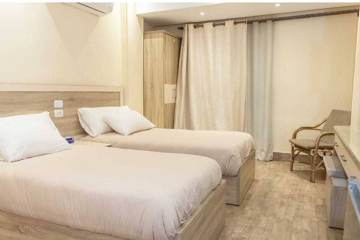 Camera Deluxe con letto matrimoniale o 2 letti singoli, vista città | Postazione laptop, tende oscuranti, insonorizzazione, Wi-Fi gratuito