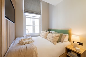 1 chambre, bureau, fer et planche à repasser, Wi-Fi gratuit