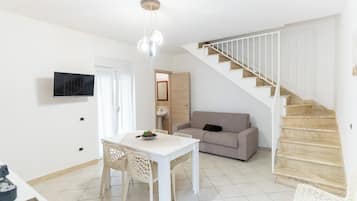 Villa, Balcony | Living area | Flat-screen TV