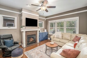 Smart TV, fireplace, DVD player, books