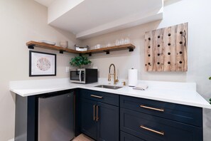 Fridge, microwave, stovetop, coffee/tea maker