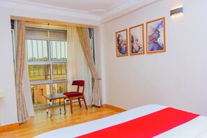 In-room safe, desk, laptop workspace, iron/ironing board - NIBA Hotel (Jinja)