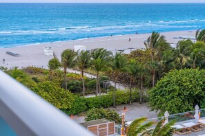 On the beach, sun-loungers, beach towels
