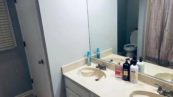 Hair dryer, towels, soap, toilet paper