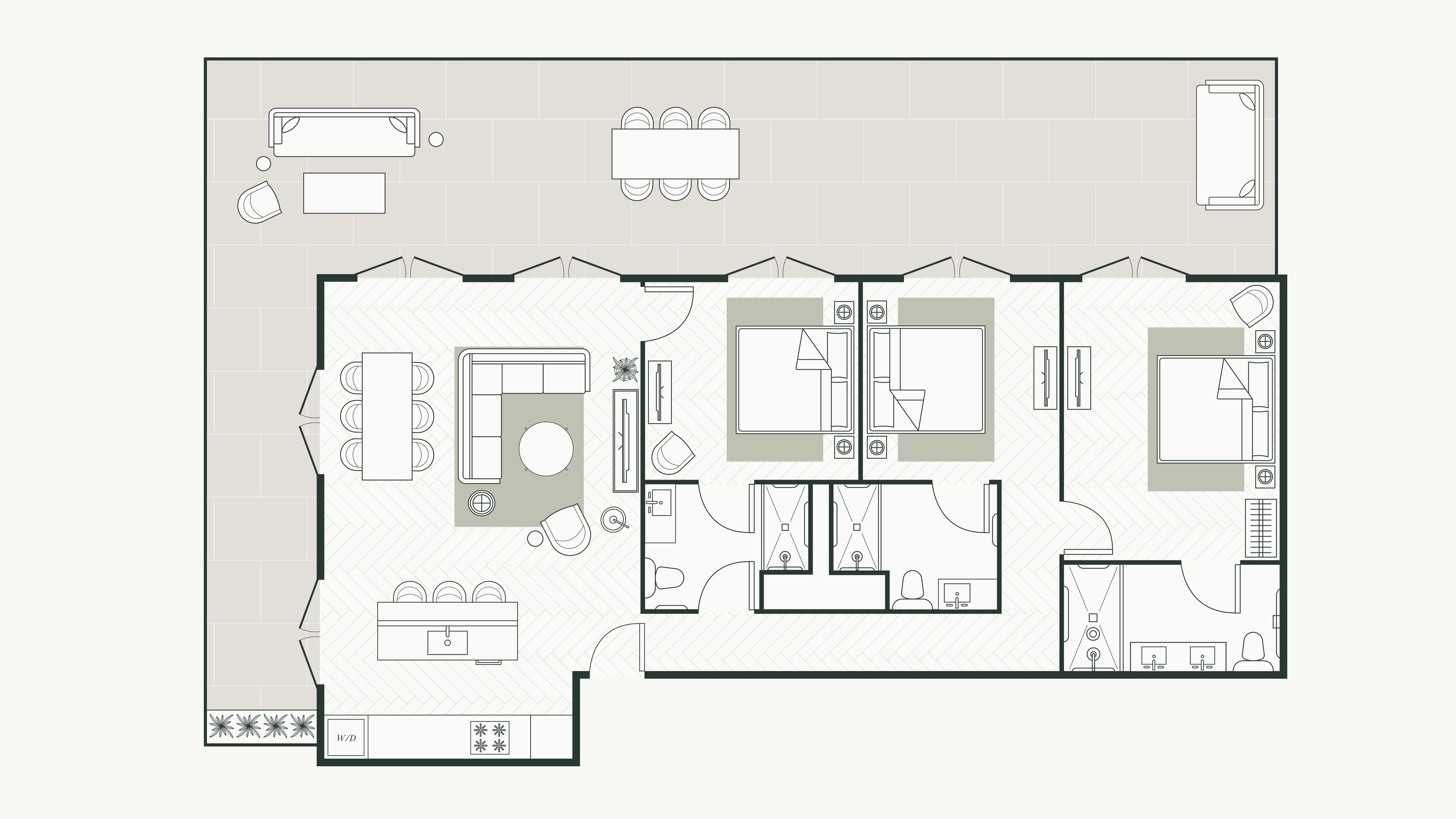 Un plan d’étage d’un hôtel comprenant un espace repas, deux chambres, une salle de bain et une kitchenette.