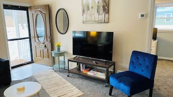 Smart TV, fireplace, table tennis, books