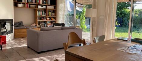 Fireplace, books, stereo, computer monitors