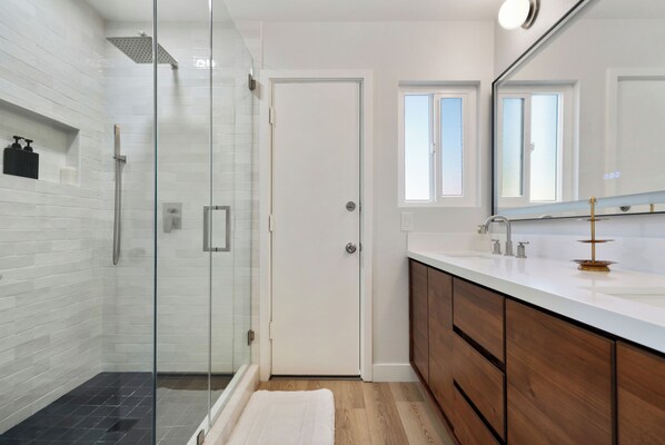 Shower, hair dryer, towels, soap