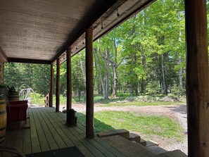 Terrace/patio - Bear's Den, A cozy 3-bedroom cabin in mature woods on Neebish Island with WiFi (Barbeau)