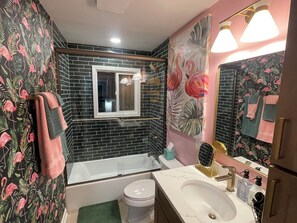 Shower, hair dryer, towels, soap