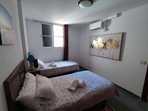 1 chambre, fer et planche à repasser, Wi-Fi, literie fournie