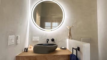 Shower, eco-friendly toiletries, hair dryer, towels