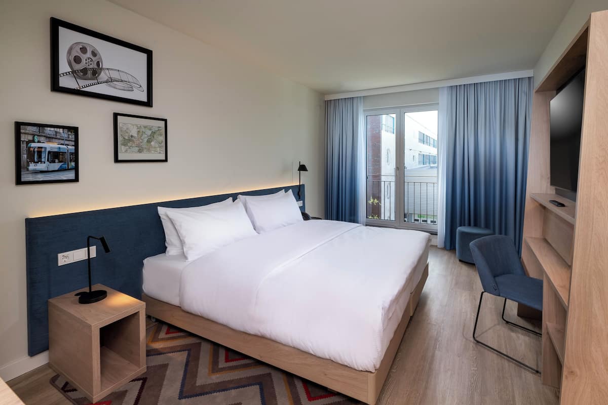 Family Room, 1 King Bed, Connecting Rooms | Minibar, in-room safe, laptop workspace, blackout drapes