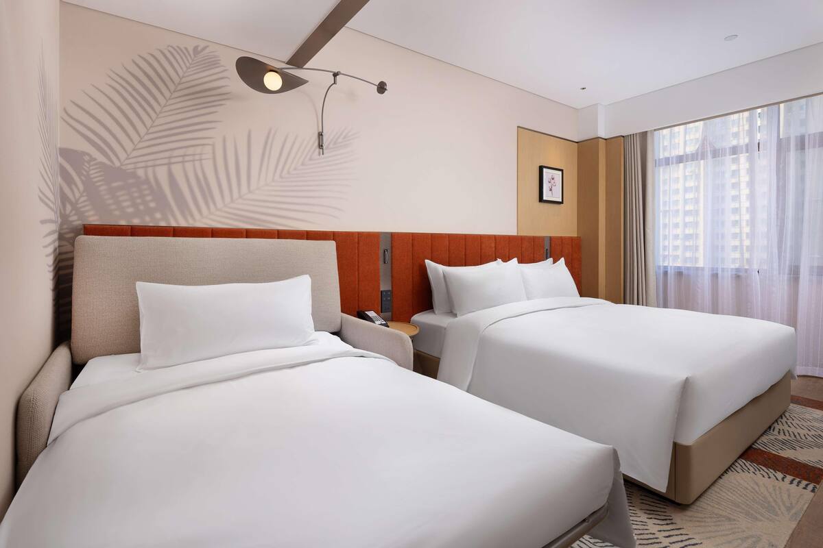 Premium bedding, down comforters, desk, laptop workspace