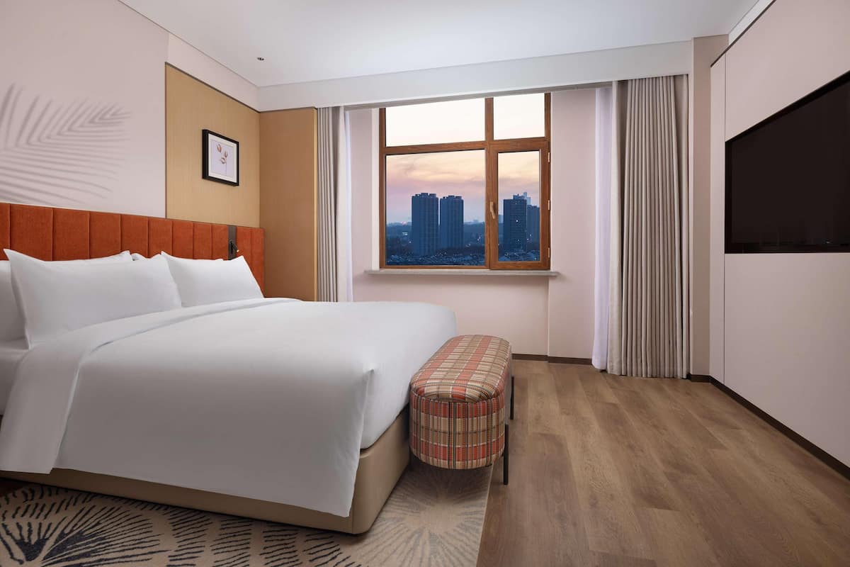 Premium bedding, down comforters, desk, laptop workspace