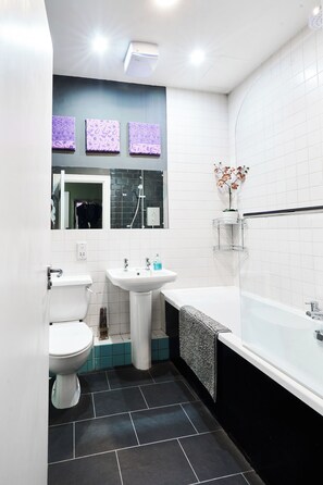 Hair dryer, towels, soap, shampoo