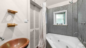 Shower, jetted tub, hair dryer, towels