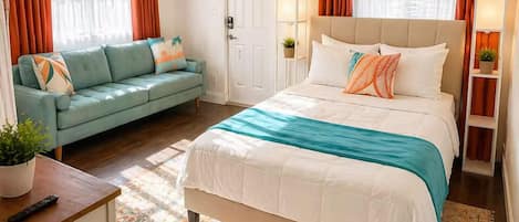 Tabla de planchar con plancha, wifi y ropa de cama